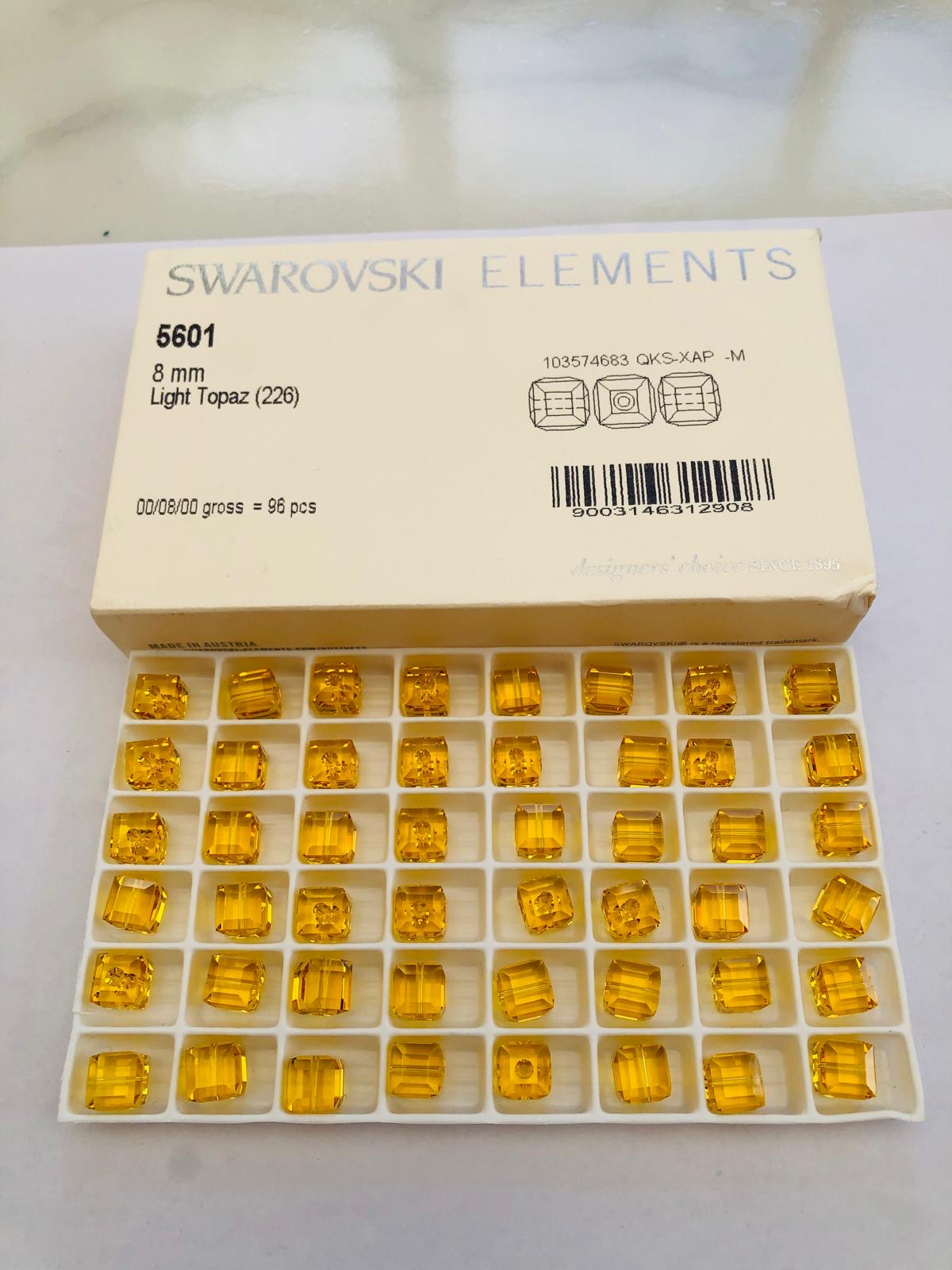 10pcs Swarovski® 8mm Light Topaz Cubic Beads ref: 5601